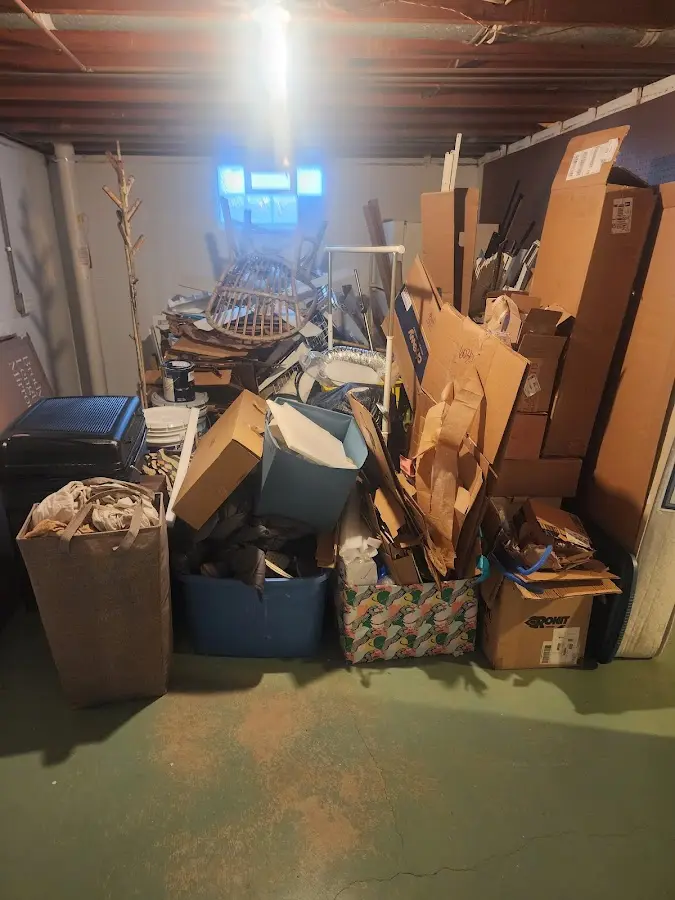 Roll-off dumpster container at job site for 4 Yard Dumpster Rental in Lake Lorraine